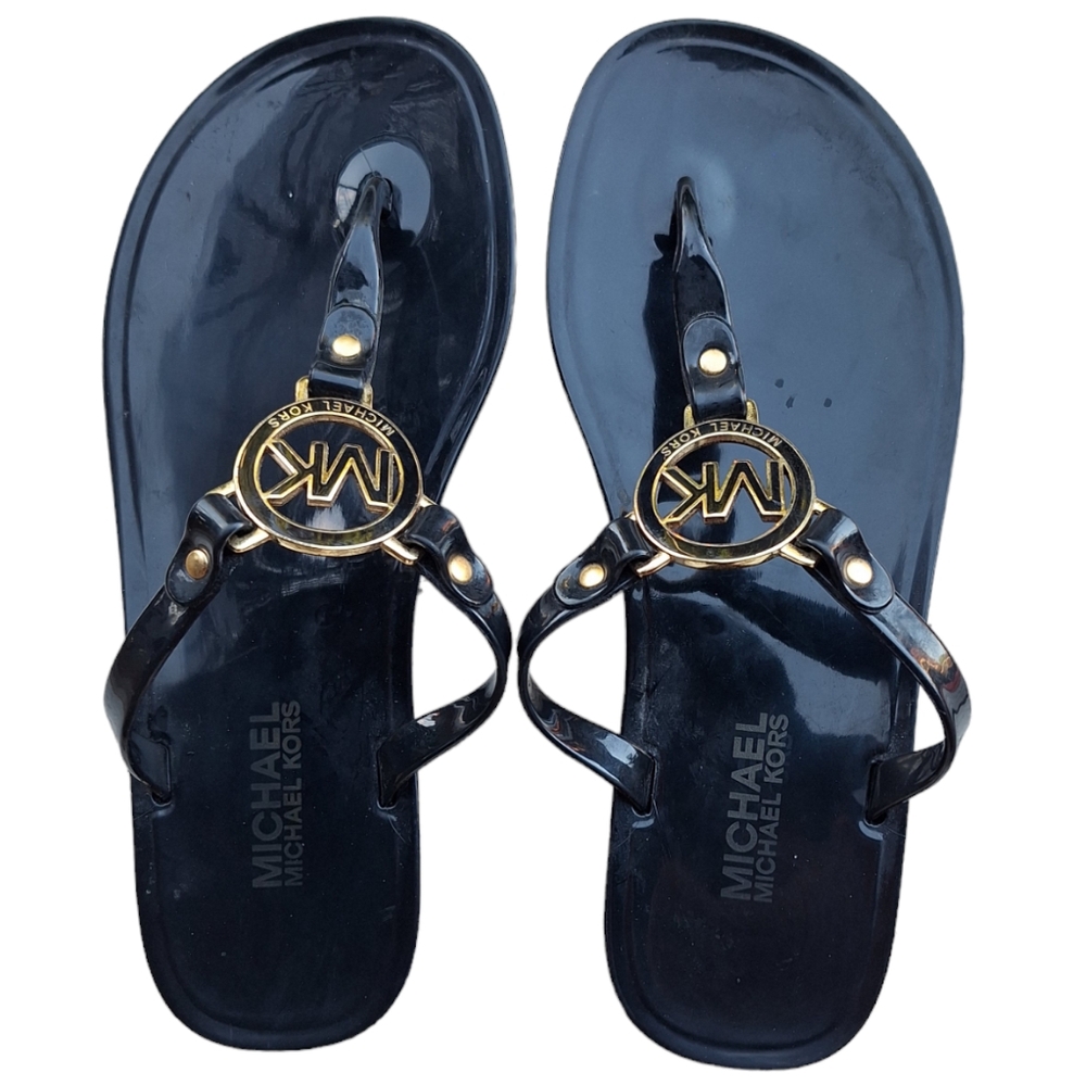 Michael Kors black gold jelly flip flop sandals, size 7US